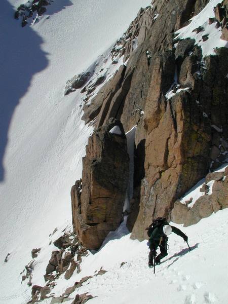 Rodger Poage on the exposed traverse onto Broadway from Lamb's Slide, May 2000.  Photographer:  Paul Crowder.