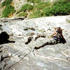 Looking down just above the anchor on the ledge at the top of pitch 1.