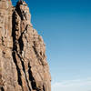 This route offers an incredible photo op with downtown Denver in the background. Fantastic 5.10 climbing!