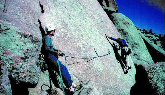 This is me leading the cruxy, 5.9 moves past the third bolt of the traverse. Jerry Verbeck on belay.