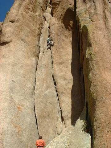 Ben Faber at the crux on Penis Dimension 5.10 at Vedauwoo.<br>
<br>
Photo: Andrew Gram