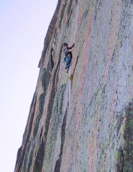 George Squibb on the 5.11c/d crux of D7 on the Diamond.