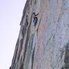 George Squibb on the 5.11c/d crux of D7 on the Diamond.