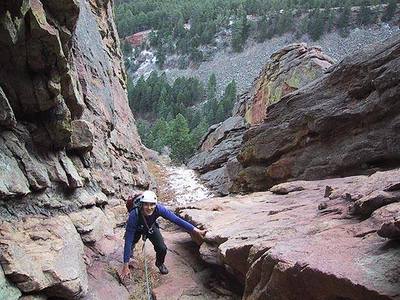Warren Teissier on the upper part of the 1911 Gully.  Below with snow is the long ramp of poison ivy and ferns.
