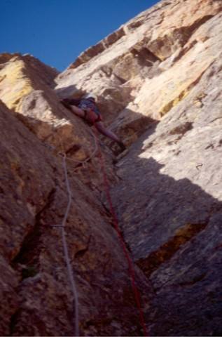 Carol leading the 2nd pitch corner on Better than Love, Hallett Peak.