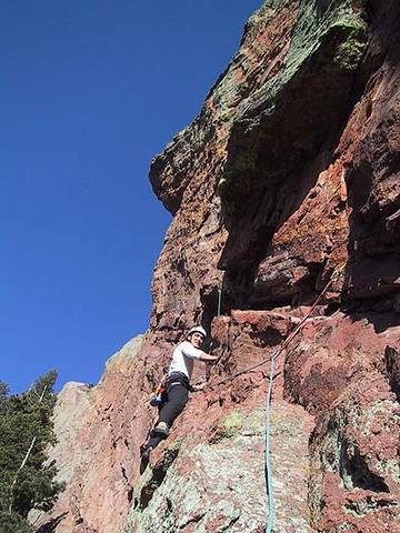 Warren Teissier on the first pitch traverse on the South Face of the Maiden (this photo may be tilted, it is steeper than this!).