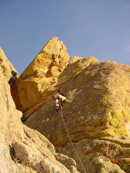 Greg Jackson finishing on the Hurley Direct (5.9) just right of the cave exit.