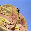 Tony Bubb leading the crux of Cruising For Bulgar (Sobo, Eldo).  Photo by Peter Spindloe