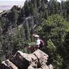 Warren Teissier from the summit of the Fourth Flatironette.  Behind him is The Regency.