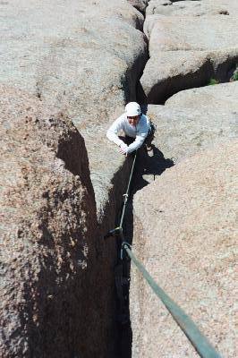 Janet approaching the crux roof on Edward's