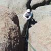 Janet approaching the crux roof on Edward's