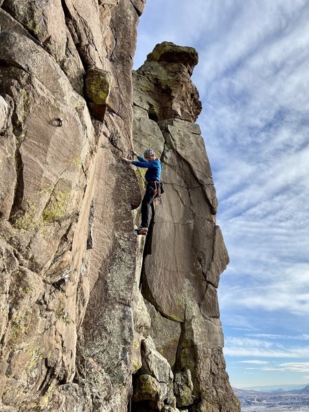 At the transition moving to the left side of the arete.