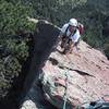 The classic final exposed moves to the summit of the Fifth Flatiron.