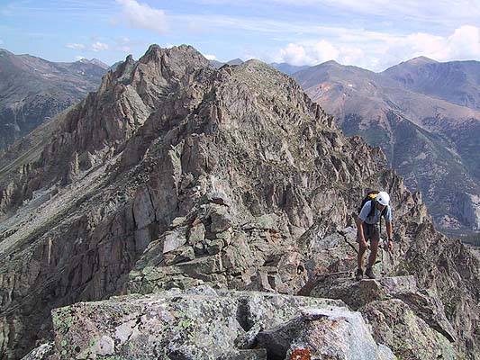 Typical scrambling along the 4' wide ridge crest.