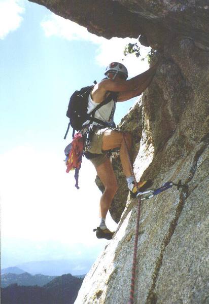 Ernie Port working the cool hand traverse at the end of P1.