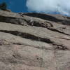 Erret is above, soloing the route.  Mike is below, leading up the route with a rope.