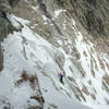 Thin but easy ice on the first pitch of the north face route.