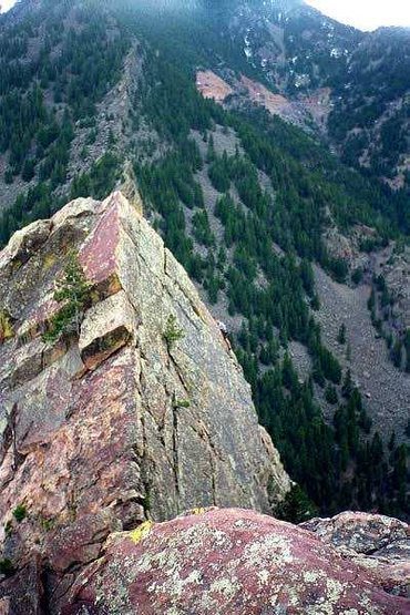 A climber reaching the final traverse of Icarus....