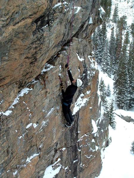 Ben moving up to the rest at the wide crack.  Photo by Dave