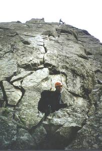 Eric at the base of the start. The person up higher is falling backwards off the route. 
