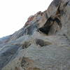 Jason Seaver pulling through the first crux of the first crux, onsight.