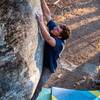 Phil Blackmar latching the jug on Green Knob (V6).
<br>

<br>
Photo: @dirtysouthclimber
<br>
Climber: @phat_phil21