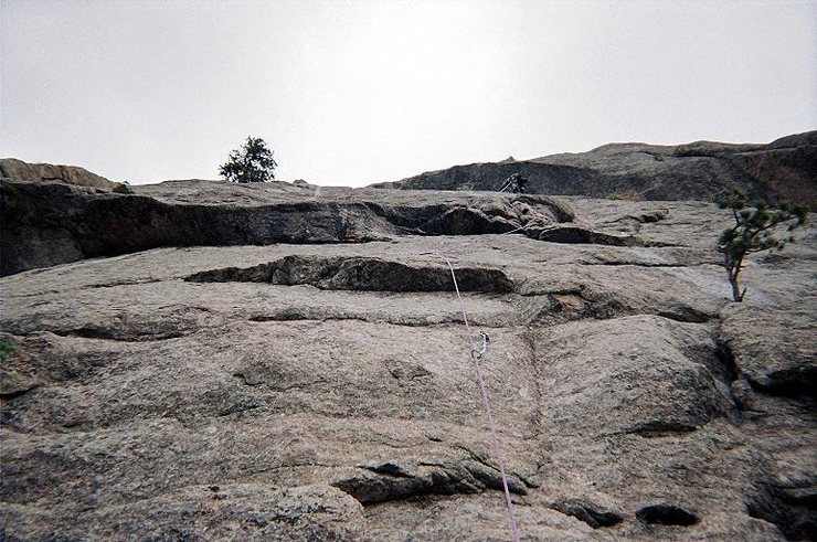 Climbing the finger crack on La Chaim.