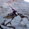 Christa Cline leading the crux hand crack on the first pitch.