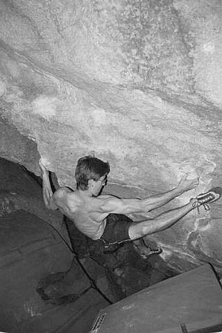 Justin Jaeger, setting his heel just right for the upcoming crux moves, by Chip Phillips.