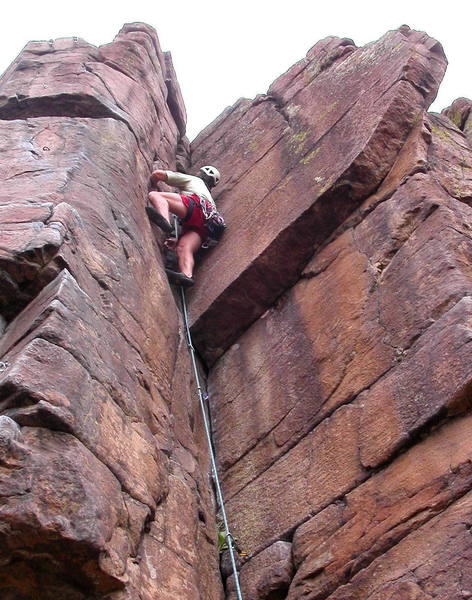 Peter Dillon contemplating the upper crux.