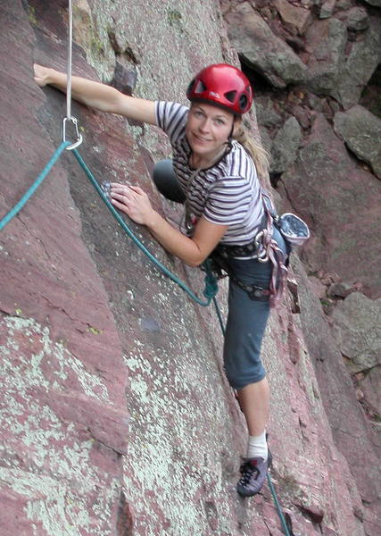 Christa Cline starting the traverse to the anchor.