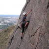 Irina Overeem climbing the thin face at the second bolt.