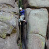 Tom grunting his way up the chimney section of Rawhide.