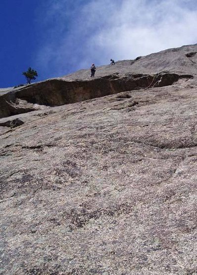 Luke Clarke belaying. At the 3rd bolt before moving left and then up to the hidden 4th bolt.