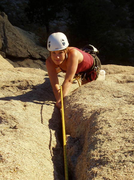 Marga Powell jamming the easy crack to the summit.