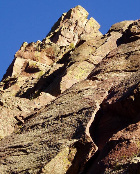 A closer view of the route with the Naked Edge and Diving Board visible above. Note the two-bolt rap anchor on the left about 1/3 up from the bottom of the photo.