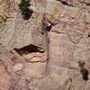 A climber turning the 5.8 roof of Calypso Direct with another party below on regular Calypso.