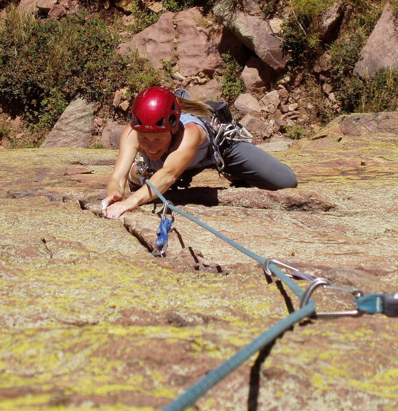 Christa Cline cranking the steep finger crack on upper T2.