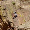 Mike Amato laybacking the steep flake on the first pitch.