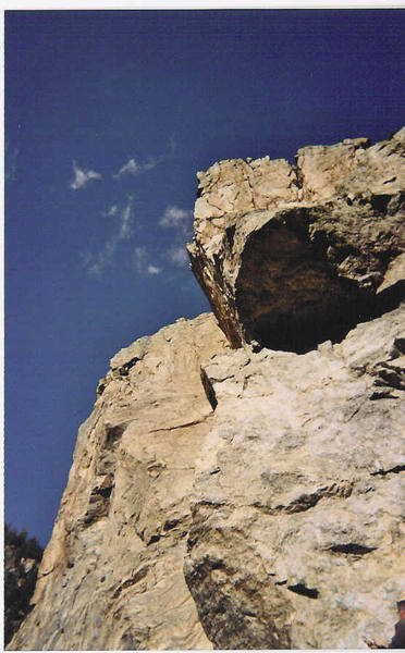 Loking up P4 to the final arete and endless blue sky.