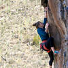 Katie Campbell working through the crux of the route