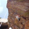 Morgan backstepping up the first crux zone on the huge Kloof roof overhang.