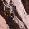 Way back, maybe the second or third "Eldo Days", Rick Lietner and I worked hard to replace the bogus old bolts.  1/2 inch rawls all the way now, except the anchor.  <br>
<br>
There is danger of rockfall here. Fall, 2003, a bunch of us ended up running for the now-questionable shelter of the wall when someone else knocked off some big flakes from Ruper.  Our gear was dusted by debris.  It would have really bad for anyone on the ramp. <br>
<br>
The many Californians I've met who thought Eldo was a pile are vindicated again. But if your a good climber looking for something steep yet easy on the fingertips(like the Owens River Gorge) and fairly well protected, then don't miss this pitch.