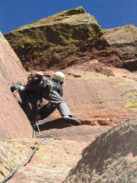 Ivan practices back step stemming on P1 crux.