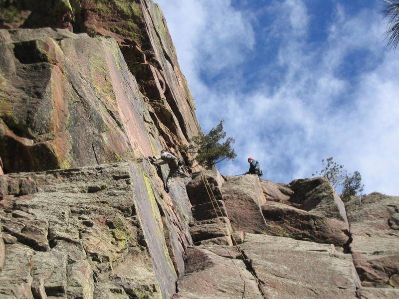 Chuck Graves powers into the strenuous finish as the sun finally comes out to warm the wall.