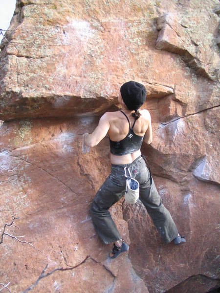 About to latch the final reachy crux toss to the rail for the send.