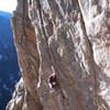 Through the boulder problem crux on Mile High Comic Crack.