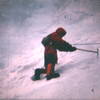 "T minus 1 year and counting"  Feb, 1968 Reed Markley chops steps in Odell's about 1 year before Chouinard would introduce his drooped pick axe. Note the long axe. In 1968 an ascent of Odell's would take most of the day!   (photo from super-8 movie film)