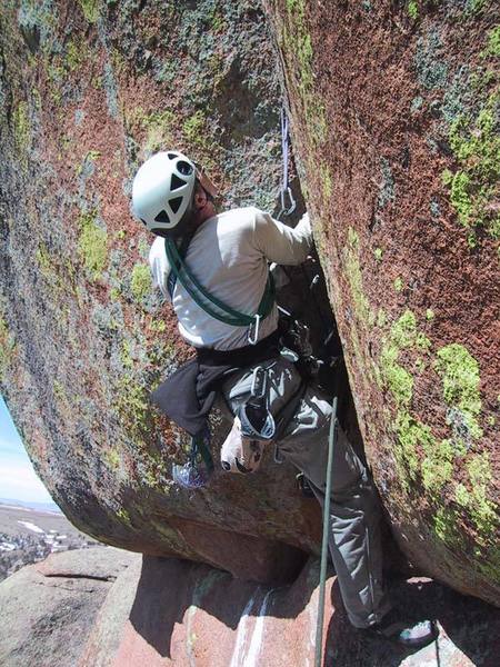 Roger starting up the overhanging crack.