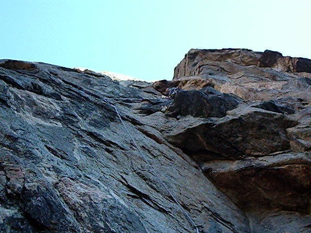 Above the runout on the first pitch.